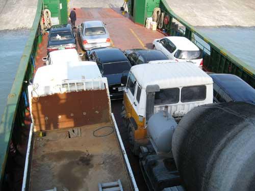 Deck Loaded with trucks and heavy vehicles
